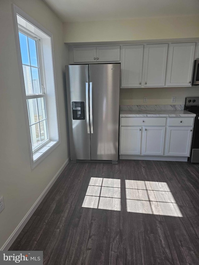 241 Rojan Rd Unit 114, Dover, DE 19901 - kitchen featuring stainless steel appliances, dark wood finished floors, baseboards, and plenty of natural light