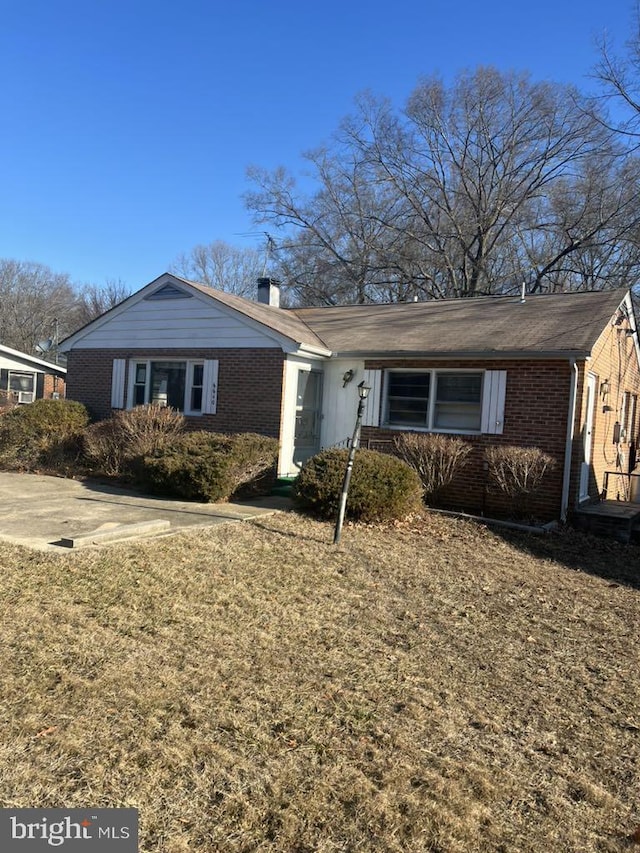 6640 Pomfret Rd, La Plata, MD 20646 - single story home featuring brick siding and a chimney