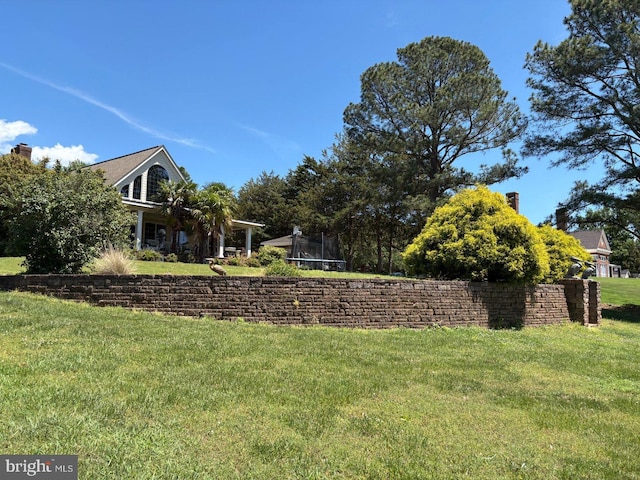 2515 Manion Dr, Williamsburg, VA 23185 - view of grassy yard featuring a trampoline