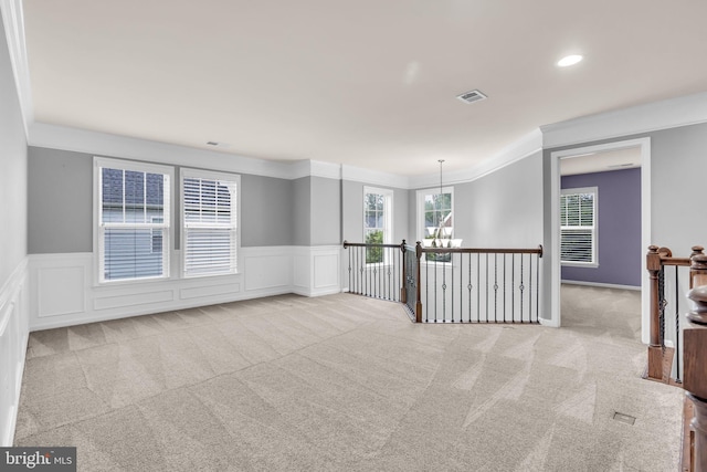 40578 Sculpin Ct, Aldie, VA 20105 - empty room featuring carpet floors, ornamental molding, a wainscoted wall, a decorative wall, and recessed lighting