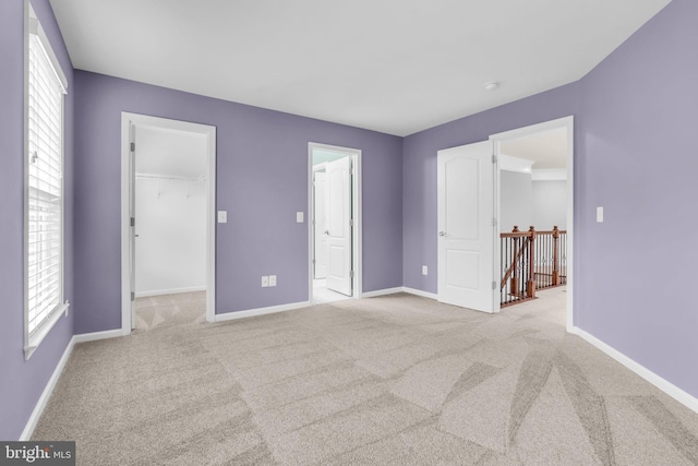 40578 Sculpin Ct, Aldie, VA 20105 - spare room featuring baseboards, healthy amount of natural light, and carpet flooring
