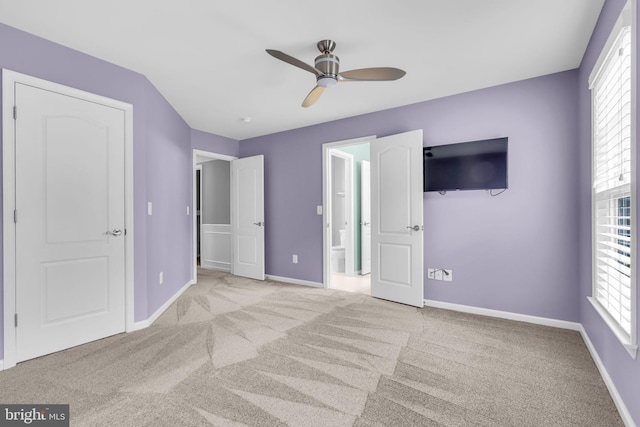 40578 Sculpin Ct, Aldie, VA 20105 - unfurnished bedroom with carpet floors, baseboards, ensuite bath, and ceiling fan