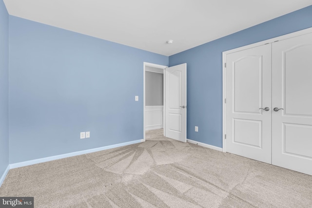 40578 Sculpin Ct, Aldie, VA 20105 - unfurnished bedroom with carpet floors, baseboards, and a closet