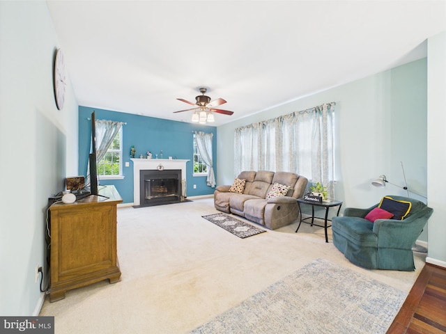 7 Meadow Lark Dr, Milford, DE 19963 - living area featuring ceiling fan, baseboards, and a fireplace with flush hearth