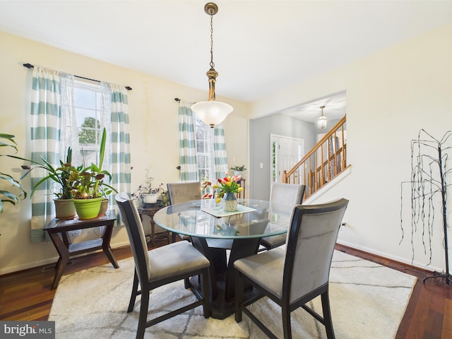 7 Meadow Lark Dr, Milford, DE 19963 - dining room featuring hardwood / wood-style floors, stairway, and baseboards