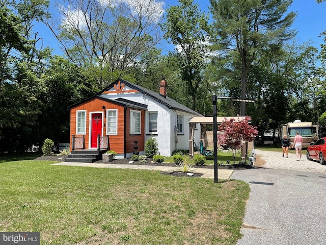 209 Hewitt Rd, Williamstown, NJ 08094 - view of front of home with a chimney and a front lawn