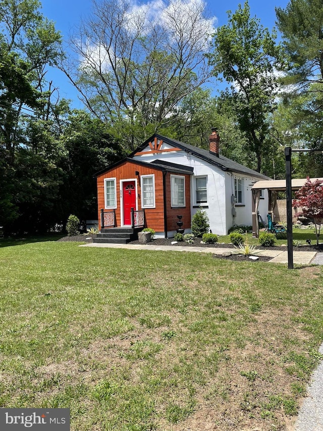 209 Hewitt Rd, Williamstown, NJ 08094 - bungalow-style home with a chimney and a front lawn