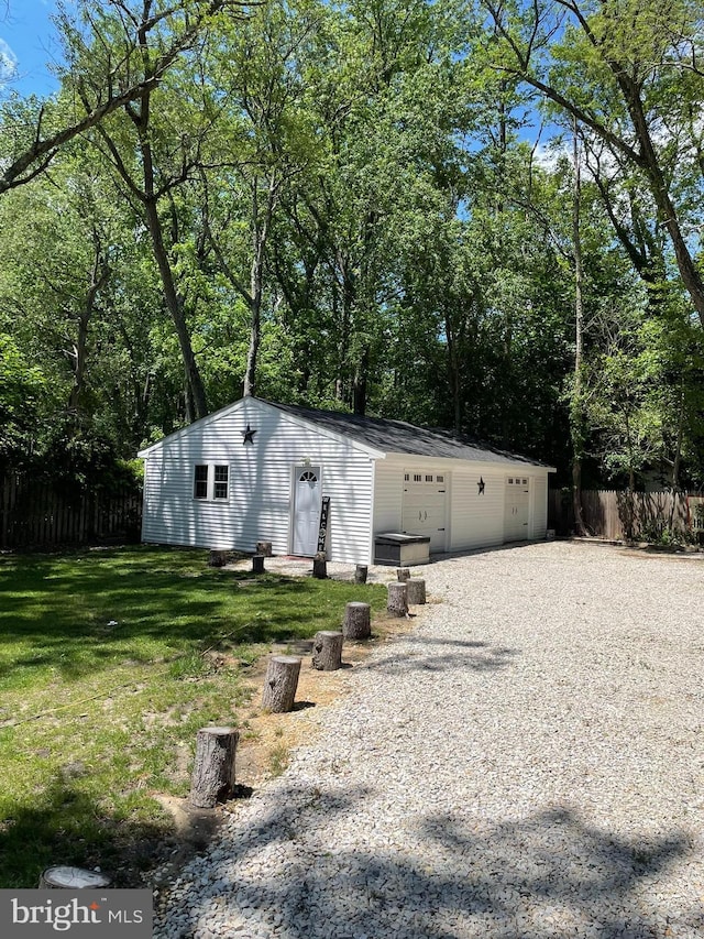 209 Hewitt Rd, Williamstown, NJ 08094 - rear view of house featuring a garage and an outdoor structure