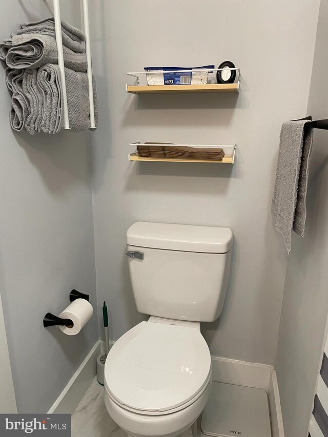 209 Hewitt Rd, Williamstown, NJ 08094 - bathroom with marble finish flooring, toilet, and baseboards