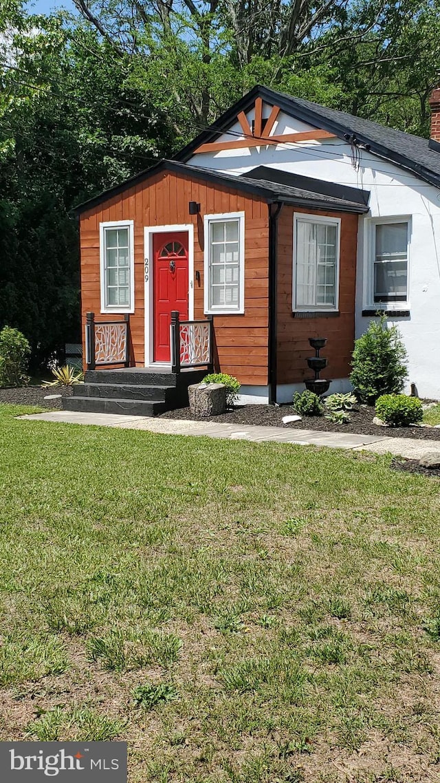 209 Hewitt Rd, Williamstown, NJ 08094 - view of front of house with a front lawn and a chimney