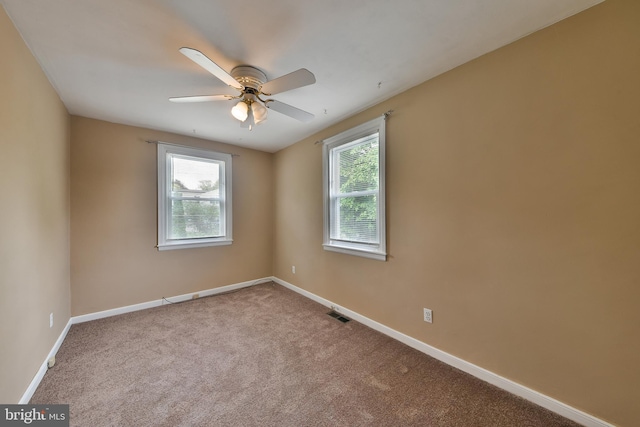 227 Rolling Hill Rd, Elkins Park, PA 19027 - spare room with baseboards, a ceiling fan, and carpet floors