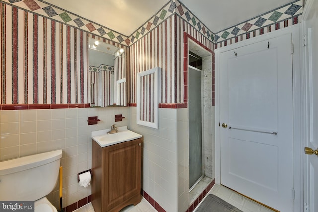 227 Rolling Hill Rd, Elkins Park, PA 19027 - full bathroom with vanity, wallpapered walls, tile walls, a stall shower, and toilet
