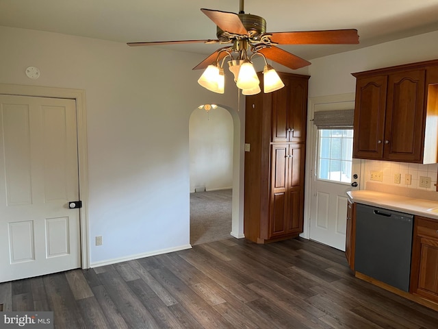 209 S Cherry St, Myerstown, PA 17067 - kitchen with dishwasher, ceiling fan, arched walkways, light countertops, and dark wood-style flooring