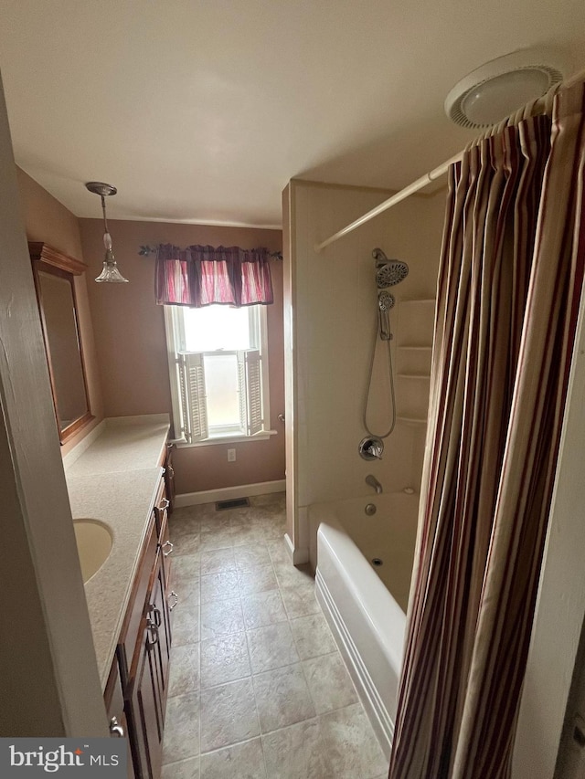 209 S Cherry St, Myerstown, PA 17067 - bathroom with vanity, shower / bath combo with shower curtain, and baseboards