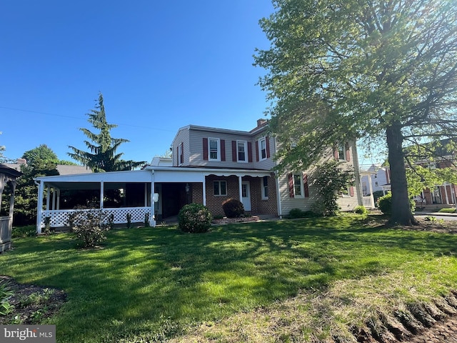 209 S Cherry St, Myerstown, PA 17067 - traditional-style house with a front lawn and a chimney