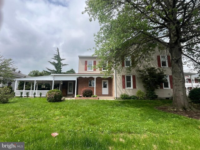 209 S Cherry St, Myerstown, PA 17067 - traditional-style home featuring a front lawn and a porch