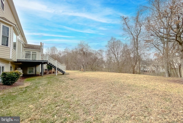 5 Cross Point Dr, Owings, MD 20736 - view of grassy yard featuring stairs and a deck