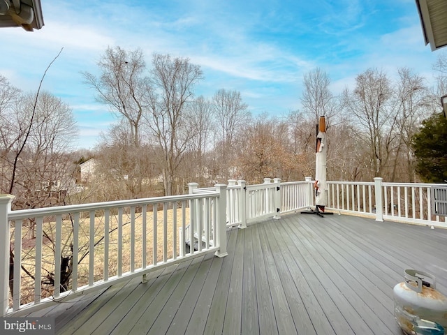 5 Cross Point Dr, Owings, MD 20736 - wooden deck with view of scattered trees