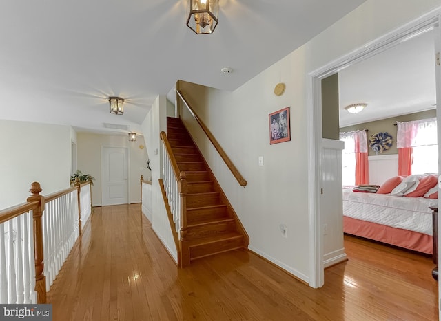 5 Cross Point Dr, Owings, MD 20736 - stairway featuring wood finished floors
