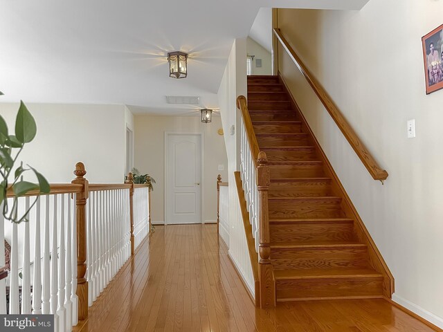 5 Cross Point Dr, Owings, MD 20736 - stairway featuring hardwood / wood-style floors and baseboards