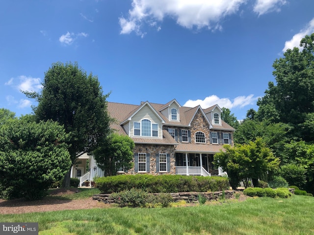5 Cross Point Dr, Owings, MD 20736 - view of front of home featuring stone siding and covered porch