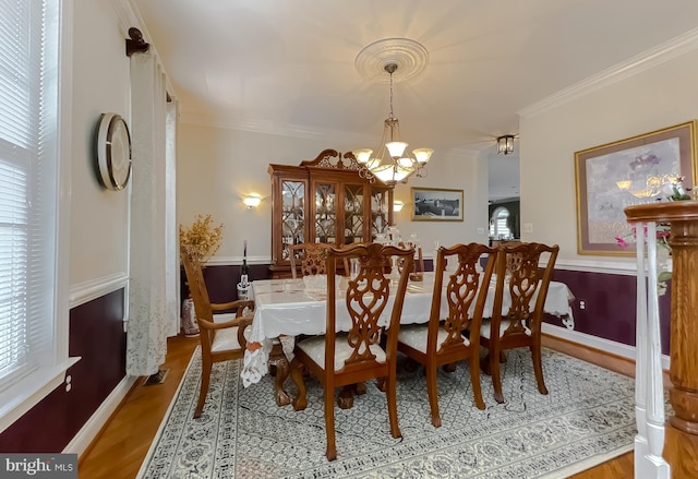 5 Cross Point Dr, Owings, MD 20736 - dining room with a chandelier, wood finished floors, and crown molding