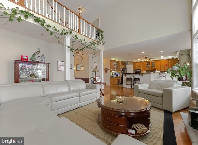 5 Cross Point Dr, Owings, MD 20736 - living area featuring a towering ceiling, a ceiling fan, and recessed lighting