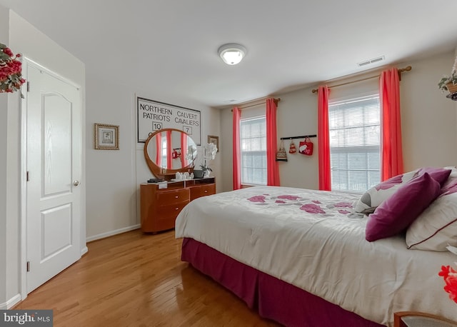 5 Cross Point Dr, Owings, MD 20736 - bedroom featuring light wood-style floors and baseboards