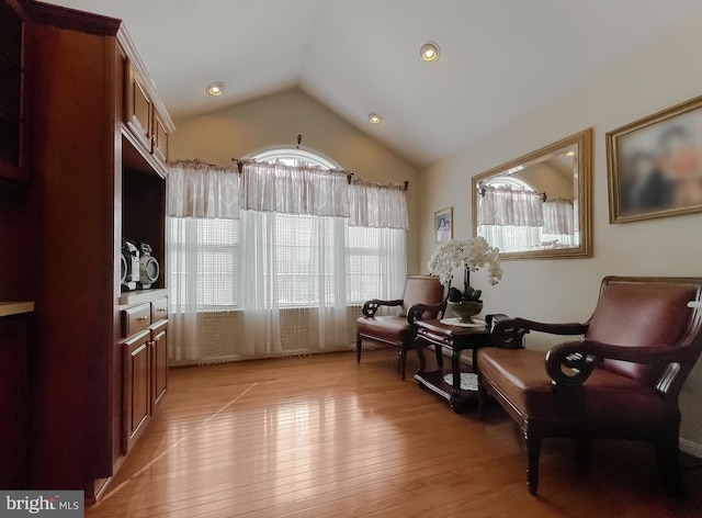 5 Cross Point Dr, Owings, MD 20736 - living area featuring vaulted ceiling and light wood-style flooring