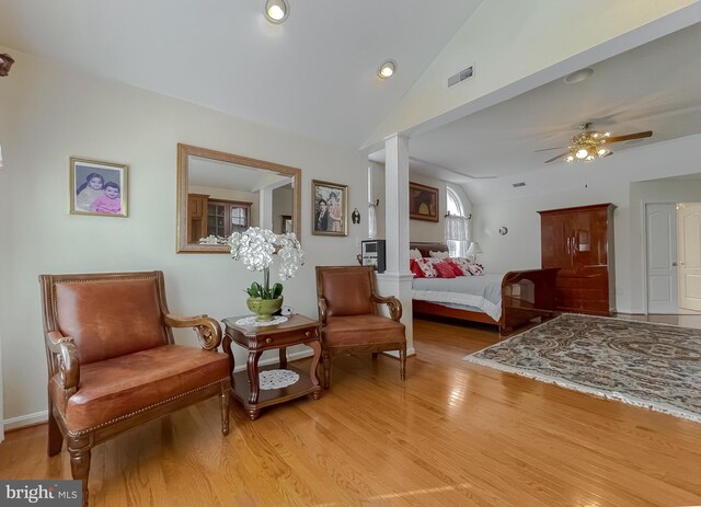 5 Cross Point Dr, Owings, MD 20736 - bedroom with lofted ceiling, light wood-type flooring, decorative columns, a ceiling fan, and recessed lighting
