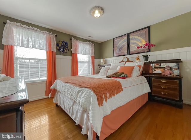 5 Cross Point Dr, Owings, MD 20736 - bedroom with wainscoting and wood finished floors