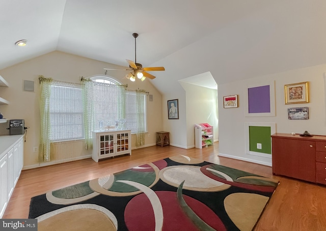 5 Cross Point Dr, Owings, MD 20736 - living room featuring ceiling fan, lofted ceiling, and light wood-style flooring