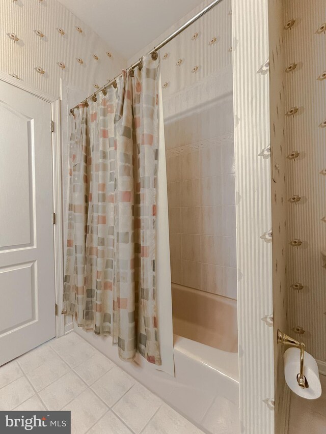 5 Cross Point Dr, Owings, MD 20736 - bathroom featuring tile patterned flooring and shower / bath combination with curtain