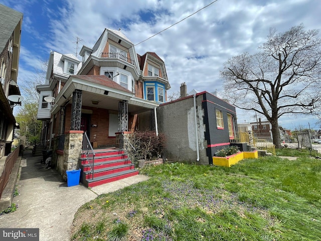 5809 Chew Ave, Philadelphia, PA 19138 - view of front of home featuring covered porch and brick siding