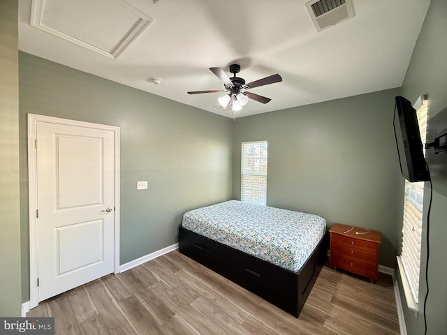7423 Rigby Pl, Elkridge, MD 21075 - bedroom featuring attic access, wood finished floors, baseboards, and a ceiling fan