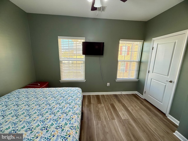 7423 Rigby Pl, Elkridge, MD 21075 - bedroom featuring wood finished floors, baseboards, and a ceiling fan