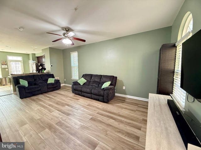 7423 Rigby Pl, Elkridge, MD 21075 - living room with a ceiling fan, baseboards, and light wood finished floors