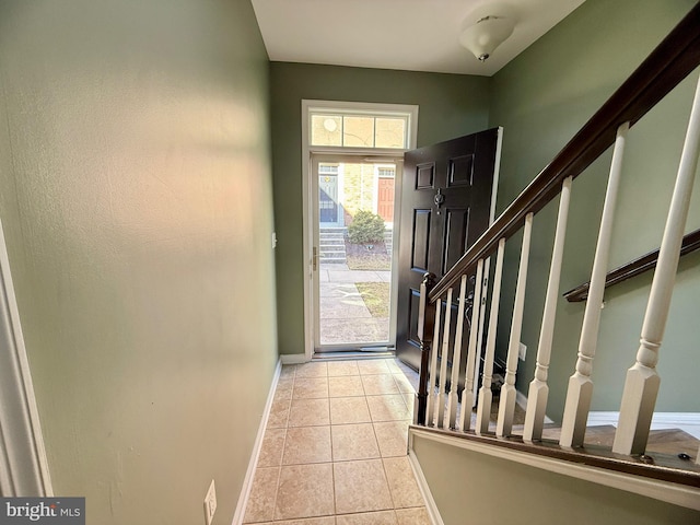 7423 Rigby Pl, Elkridge, MD 21075 - foyer entrance featuring baseboards, stairs, and tile patterned flooring