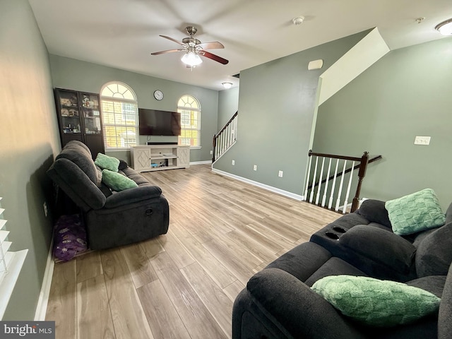 7423 Rigby Pl, Elkridge, MD 21075 - living area featuring a ceiling fan, wood finished floors, and baseboards