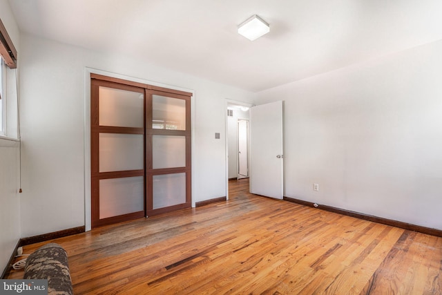 7129 Chandler Ave, Pennsauken, NJ 08110 - unfurnished bedroom featuring light wood finished floors and baseboards