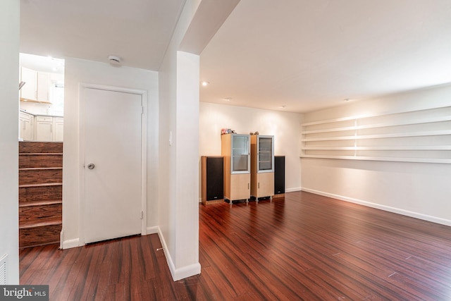 7129 Chandler Ave, Pennsauken, NJ 08110 - unfurnished room featuring wood finished floors, baseboards, a smoke detector, and stairway