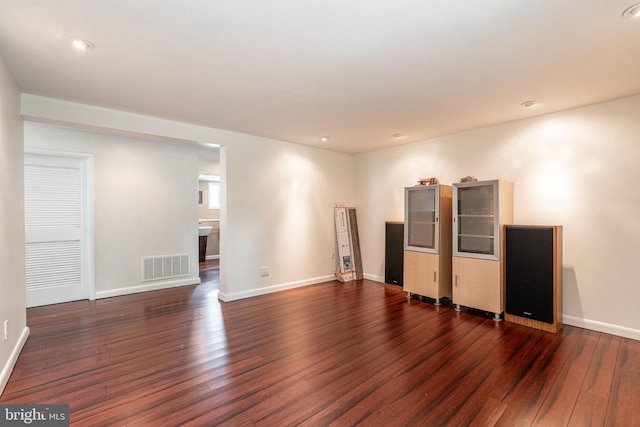 7129 Chandler Ave, Pennsauken, NJ 08110 - unfurnished living room featuring dark wood-type flooring, baseboards, and recessed lighting