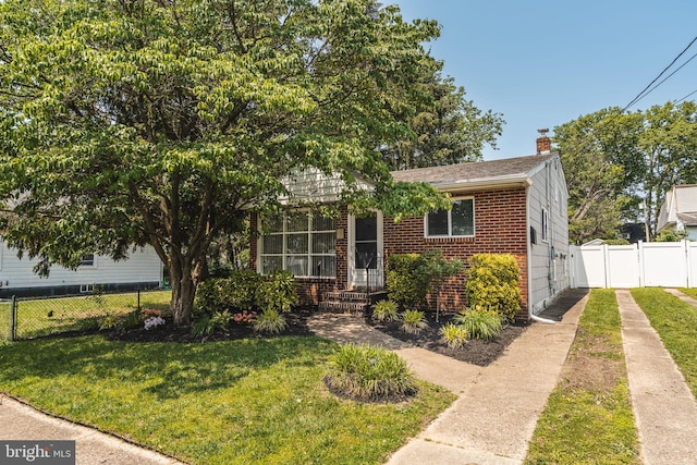7129 Chandler Ave, Pennsauken, NJ 08110 - view of front of property featuring brick siding and a chimney