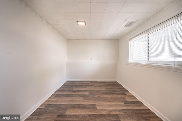 7129 Chandler Ave, Pennsauken, NJ 08110 - spare room featuring dark wood-style flooring and baseboards