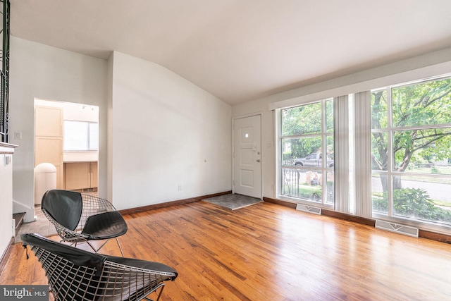 7129 Chandler Ave, Pennsauken, NJ 08110 - entrance foyer featuring lofted ceiling, wood finished floors, and baseboards