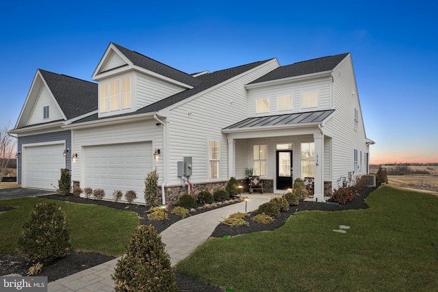 1052 Webster Ct, Winchester, VA 22603 - modern farmhouse style home with a yard, driveway, stone siding, a standing seam roof, and central AC