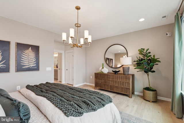 1052 Webster Ct, Winchester, VA 22603 - bedroom with wood finished floors, a chandelier, baseboards, and recessed lighting