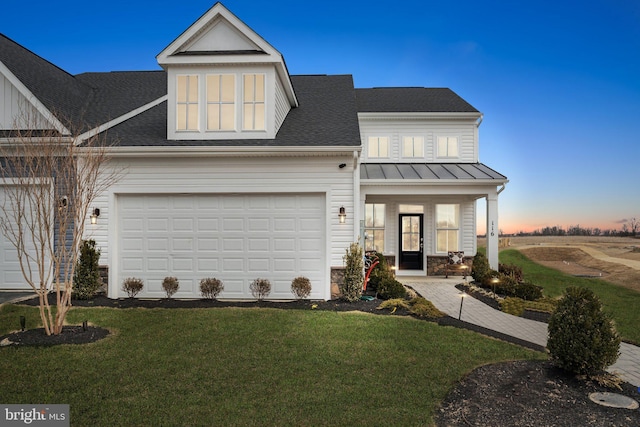 1052 Webster Ct, Winchester, VA 22603 - view of front facade featuring a front lawn, a standing seam roof, roof with shingles, covered porch, and metal roof