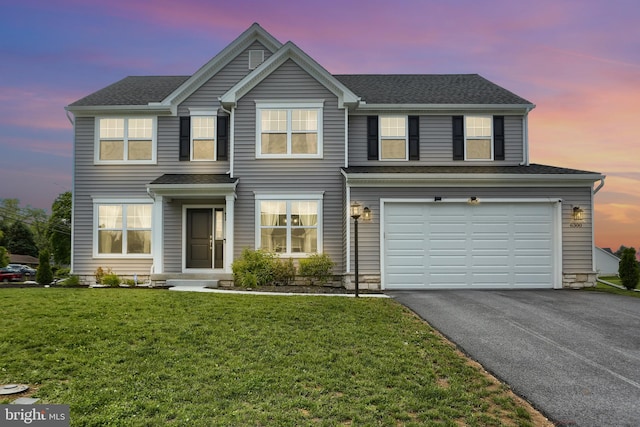 6300 Neha Dr Unit 32, Mechanicsburg, PA 17050 - traditional home with driveway, a garage, a front lawn, and a shingled roof