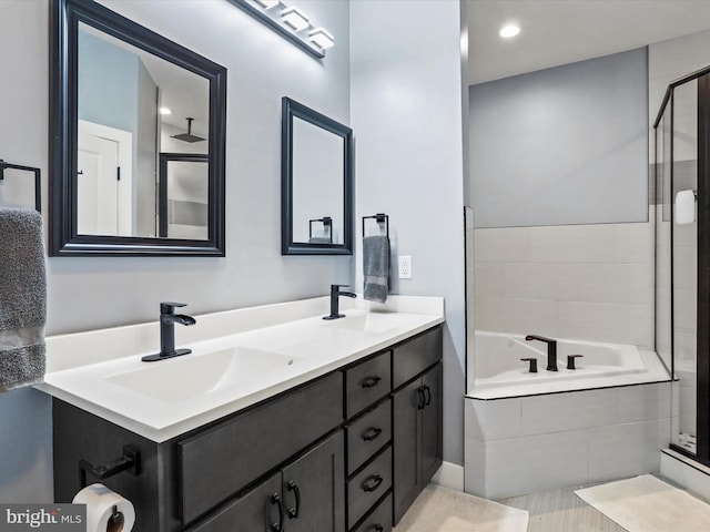 3447 Old Leetown Pike, Ranson, WV 25438 - full bathroom featuring tiled tub, double vanity, and tiled shower